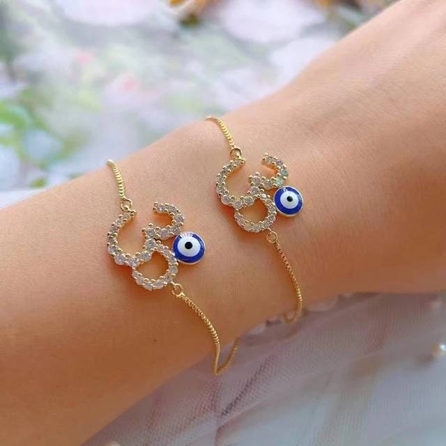 Om, evil eye Cz adjustable bracelet